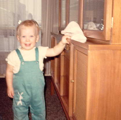 Curator at young age, dusting